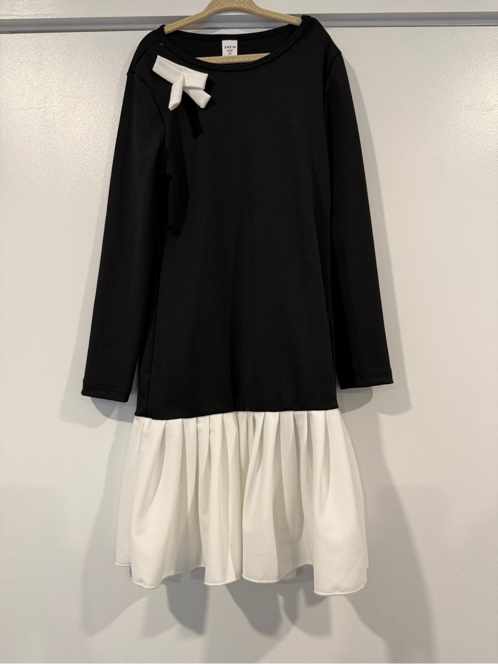 Black and white drop waist dress with pleats
